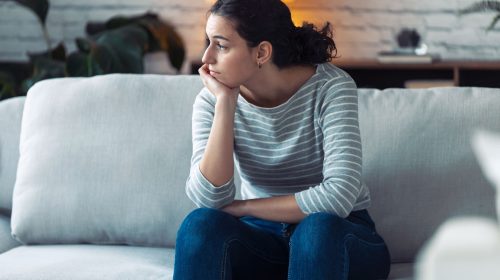 Frustrated individual stuck at home