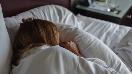 Person in bed sick