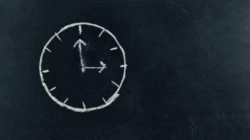 Clock drawn on a blackboard