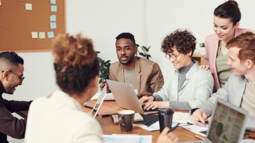 Group of employees having a feedback meeting
